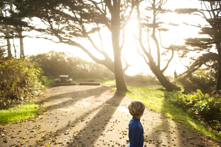 Boy looks out at the Pacific Ocean from Kalaloch campground in Olympic National Park