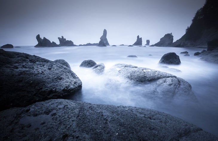 Point of Arches at the southern tip of Shi Shi Beach at high tide.