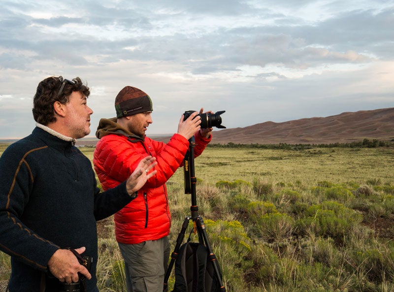GSD-NightSkies09_LinseyDodaro_800 Tamron photographer Andre Costantini helps a workshop participant at Great Sand Dunes National Park