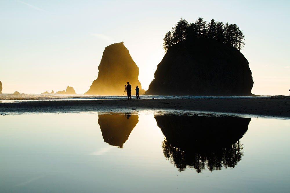OL-Second-Beach-Sea-Stacks-photographer_JBailie_1000 A photographer is reflected in front of giant seastacks.