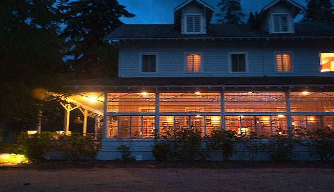 OL-Lake-Crescent-Lodge-night_FlickrJonathanRosoff_680 The lights glow through the divided windows of the dining room at Lake Crescent Lodge.